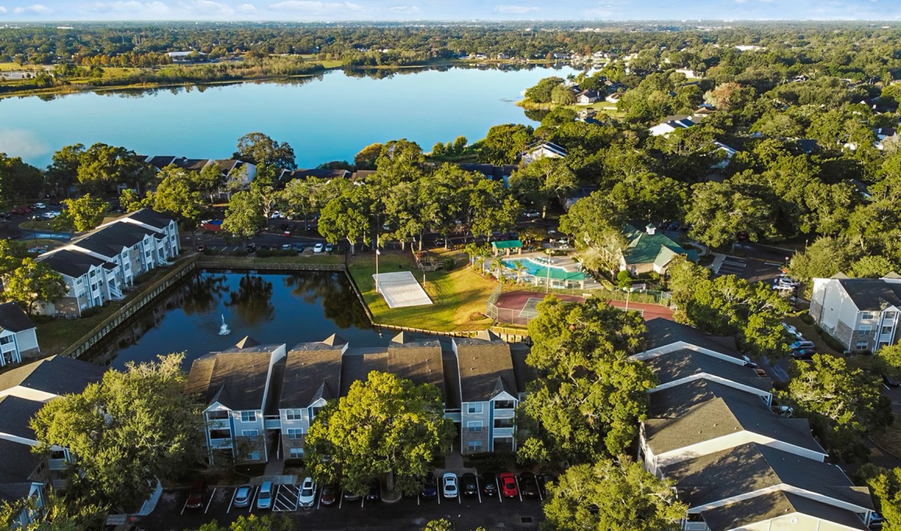 aerial view of apartments and bodies of water
