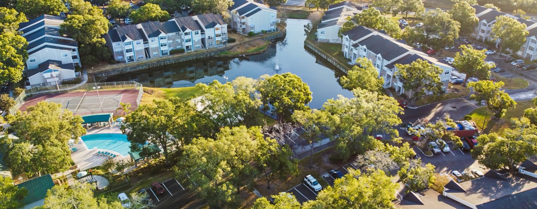 aerial view of apartments and pool
